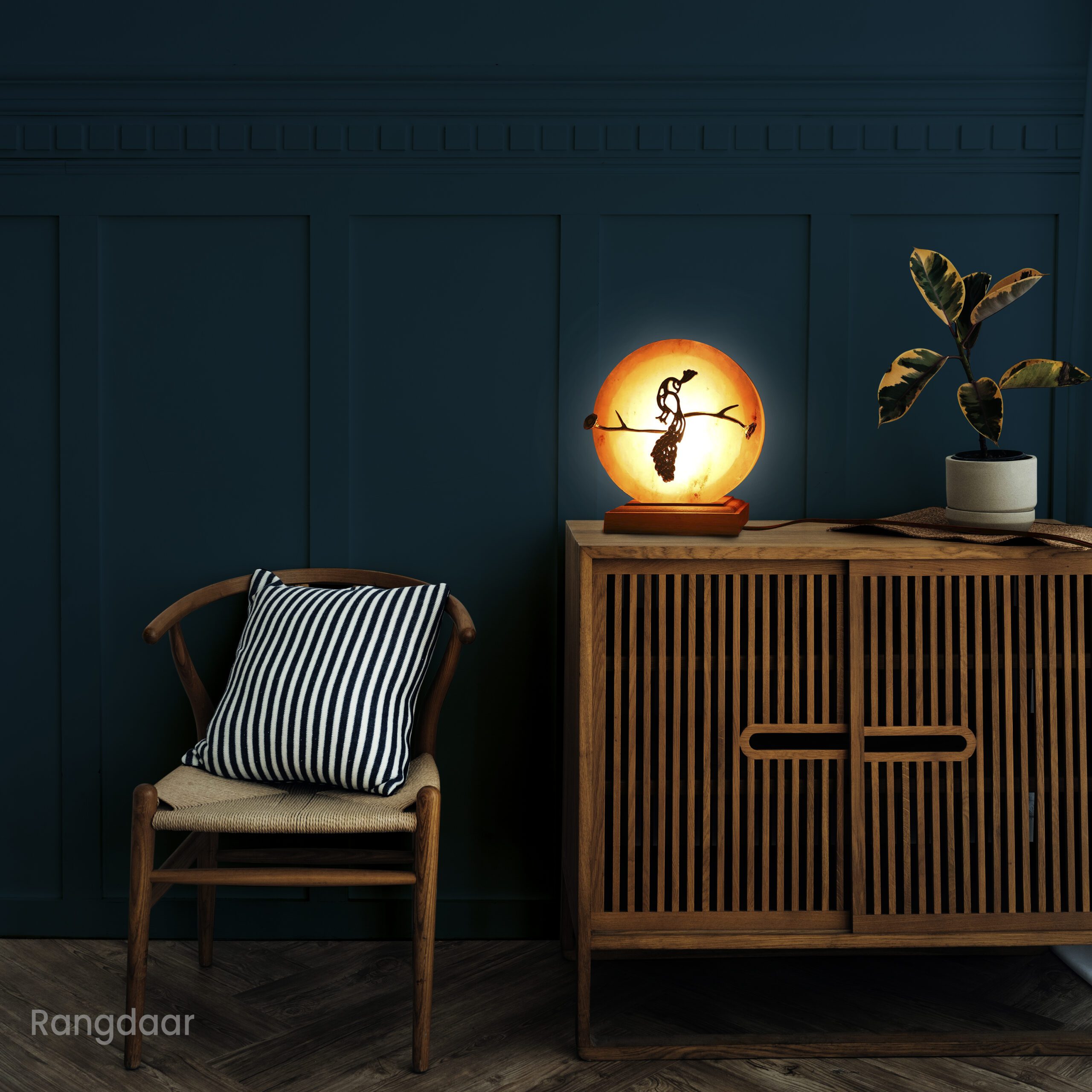 Scandinavian vintage wood cabinet with chair by a dark blue wall
